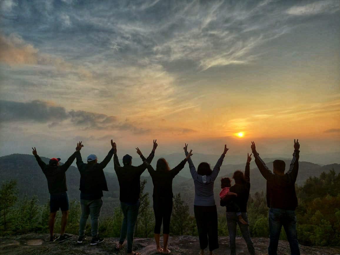 Guests enjoying sunset at the private estate viewpoint