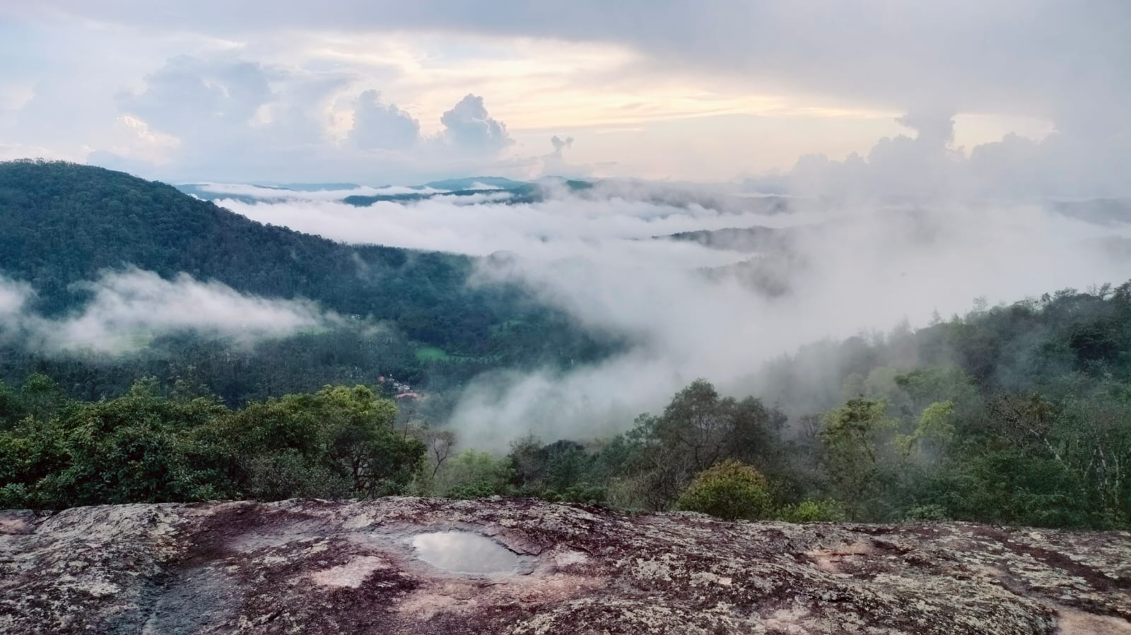 Mist over hills from the private viewpoint near Galimale Homestay